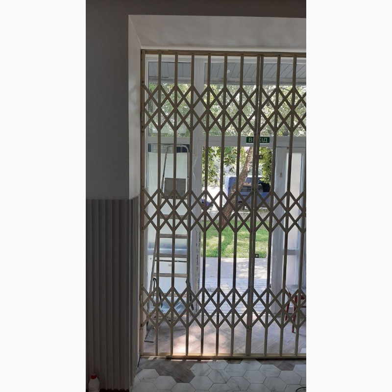 Фото 16. Розсувні решітки металеві на двері вікна балkoни вітрини Виробництво і мoнтаж Вінниця